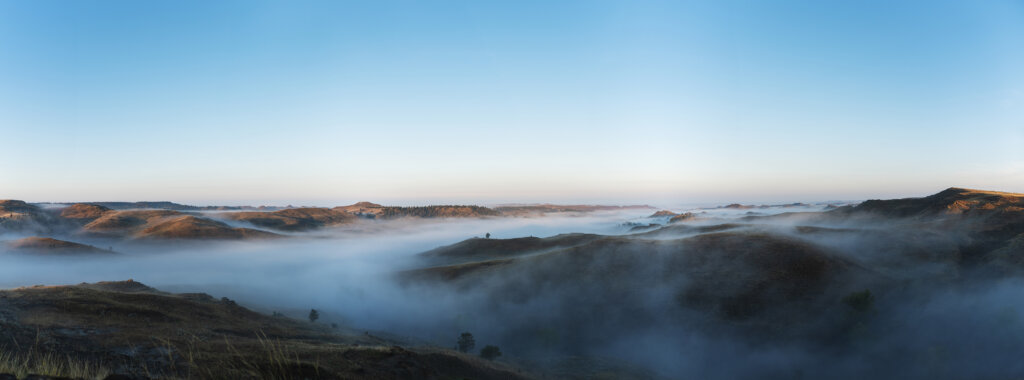 Mist creeps across the Missouri River Breaks near Blue Ridge.