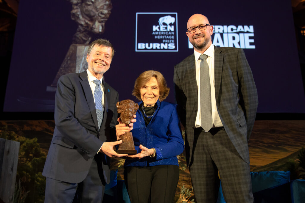 Dr. Sylvia Earle (center) accepts the Ken Burns American Heritage Prize from namesake Ken Burns (left) and American Prairie Board Chair Bill Hilf (right).